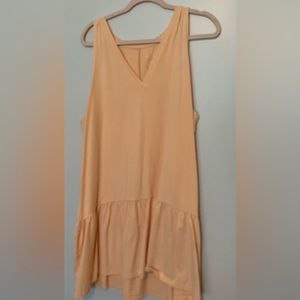 Peachy/orange mini dress with ruffle detail
